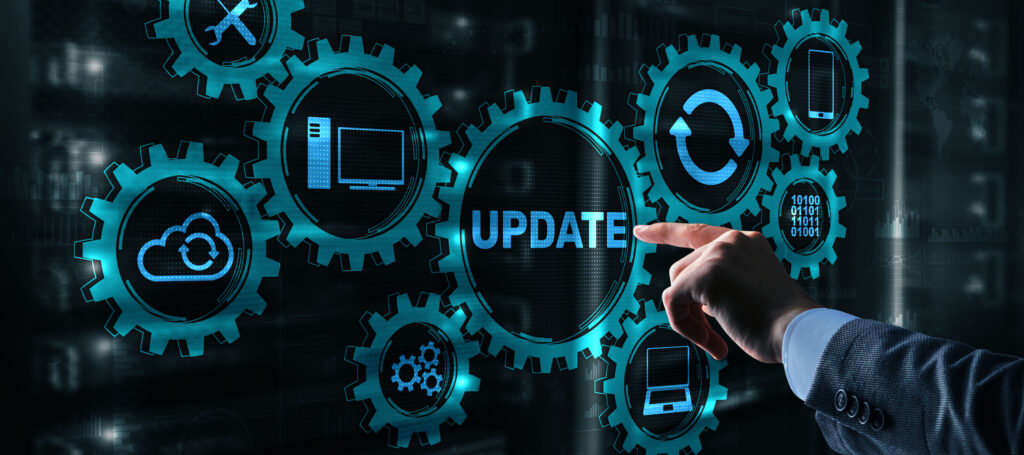 businessman is pressing on the virtual screen update software computer