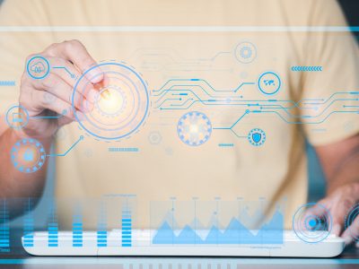 a programmer uses a virtual hologram display, manipulating data